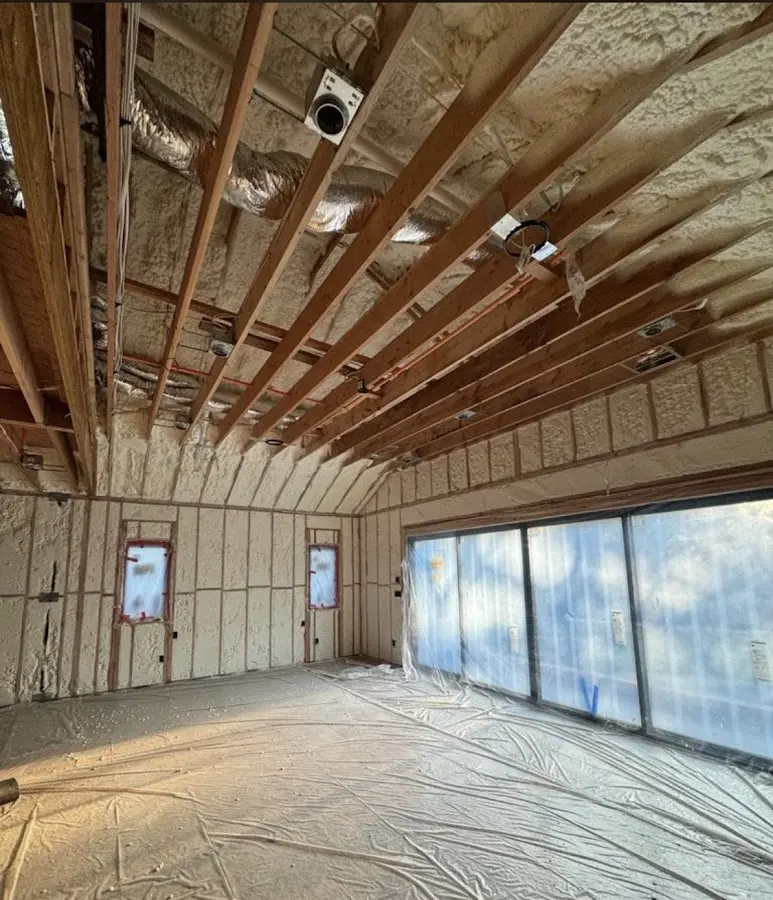 Interior walls and ceiling insulated with spray foam during new construction in Agoura Hills